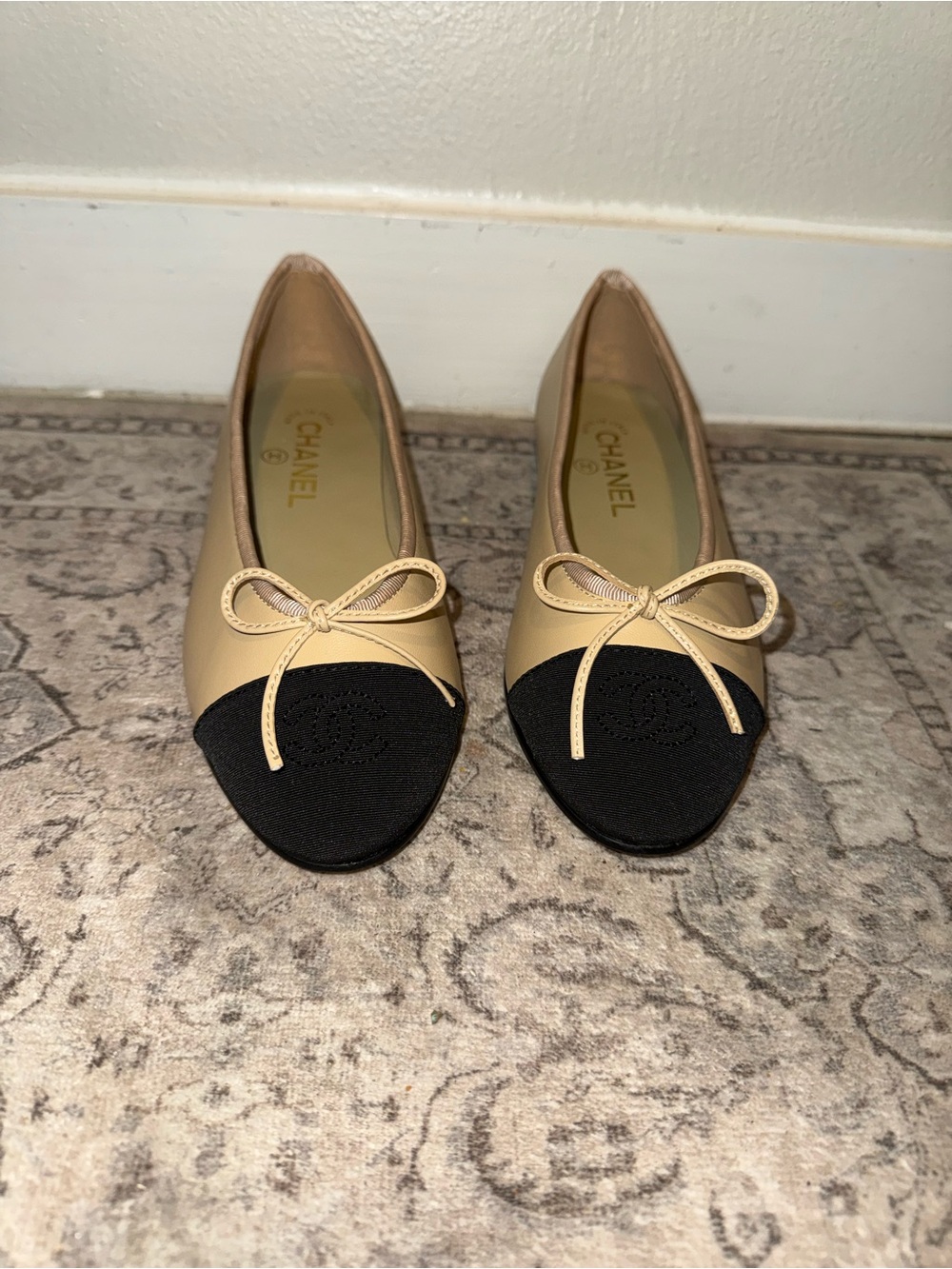 CHANEL Beige and Black Cap-Toe Leather Ballet Flats